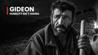 Gideon the reluctant warrior grips a wooden staff on a bare hillside, his uneasy gaze echoing his claims of inadequacy.