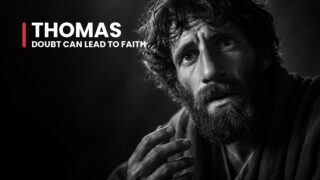 Thomas the questioning disciple reaches forward in a dim room, his lifted eyes and parted lips conveying searching doubt.