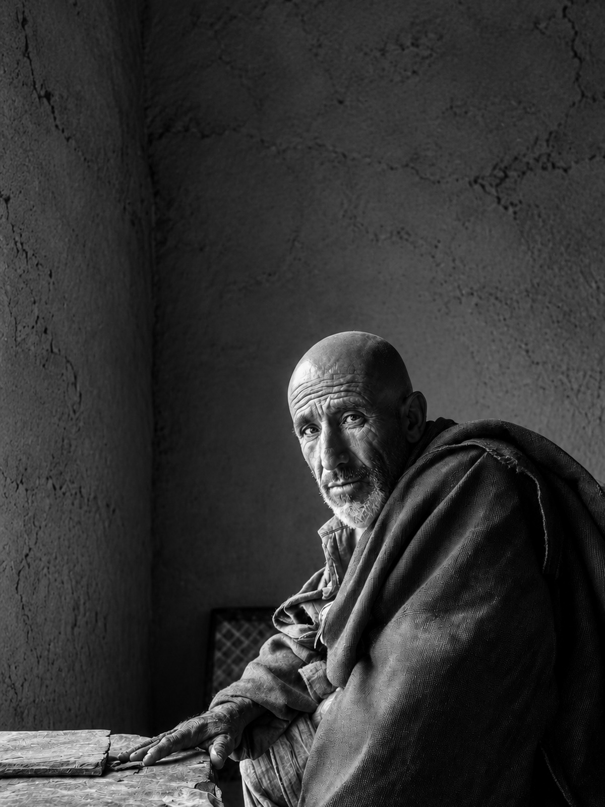 Illustrated black-and-white portrait of Ahithophel in a worn ancient room.